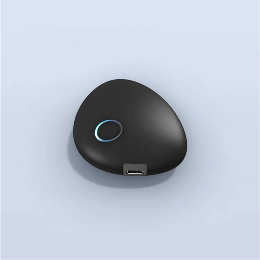 Sensate 2, a pebble-shaped vibration device worn on the chest
